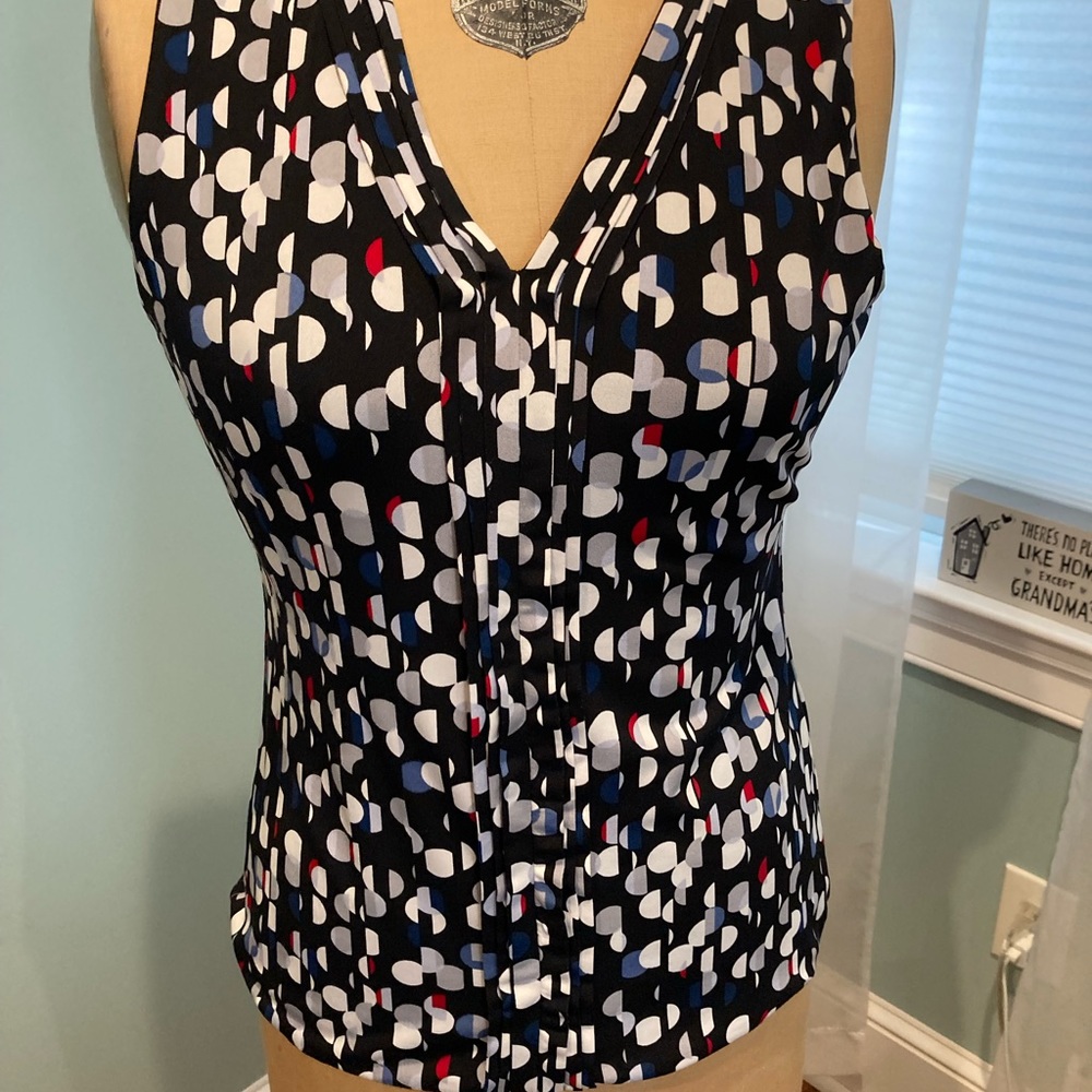 White House Black Market sleeveless fully lined top, size medium petite.